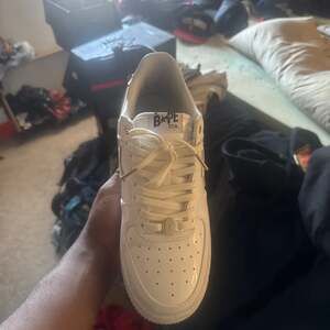 A Bathing Ape BAPE STA Low Triple White Patent Leather Sneakers